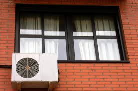 La preinstalación en la finca de un sistema de aire acondicionado limita el derecho a instalarlo en la fachada